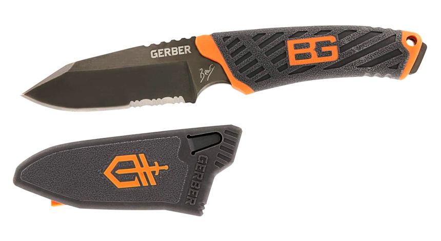 Le couteau de survie Bear Grylls Gerber Compact avec le fourreau en PVC à côté